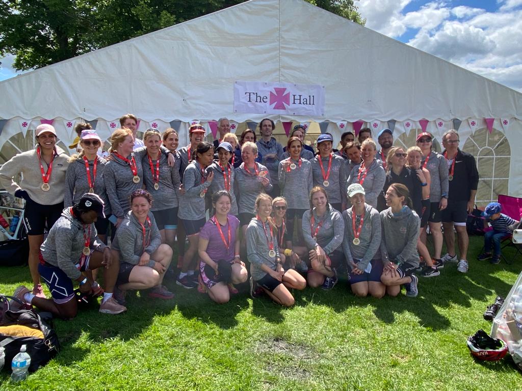 The Hall School Triathlon competitors in front of marquee