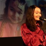 Sohana smlling singing darcy background LR